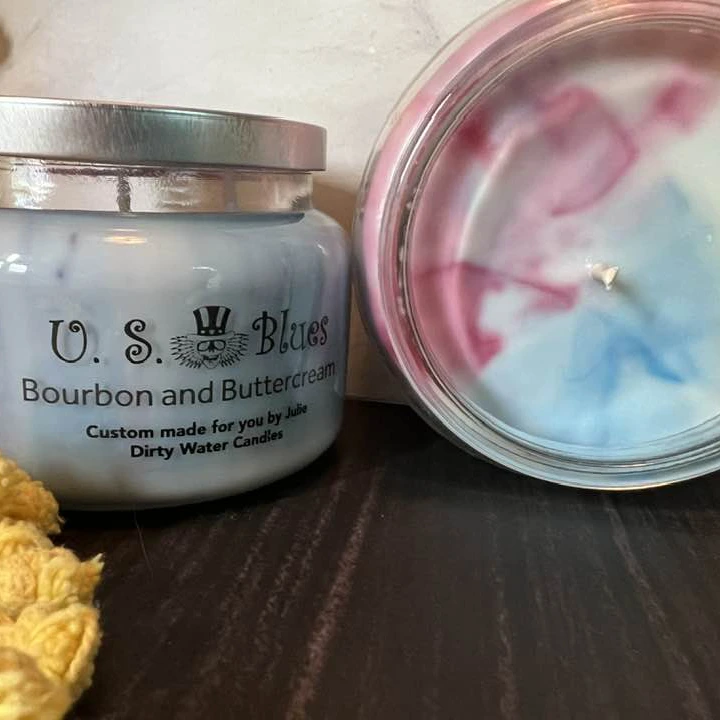 Candle U. S. Blues, shows open jar